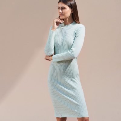 Apparel shot of a mint ribbed knit dress, back view. By Nick van der Touw.