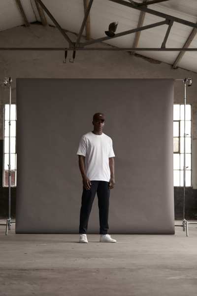 Muti Collection One 2022 campaign frame inside a warehouse. Fashion photography by Nick van der Touw.