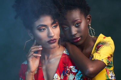 Studio portrait of two women with bold makeup. Fashion photography by Nick van der Touw.