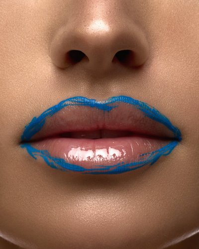 Macro beauty close-up of Albina's cobalt-lined lips. Studio editorial by Nick van der Touw.