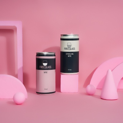 Product shot of First Glass canned sparkling wine on pink. By Nick van der Touw.
