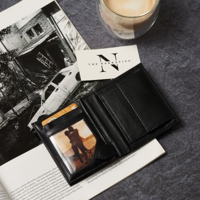 Product shot of a black leather wallet with cards. By Nick van der Touw.