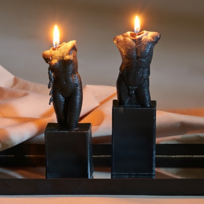 Product shot of bronze figurine sculptures on plinths. By Nick van der Touw.