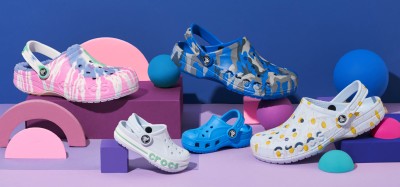 Product shot of colourful clogs on pastel blocks. By Nick van der Touw.