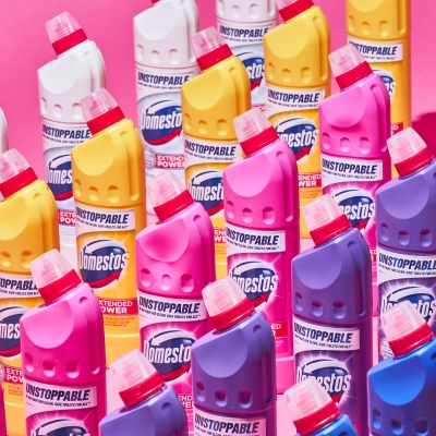 Product shot of Domestos cleaning products on purple. By Nick van der Touw.