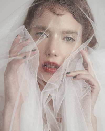 Beauty portrait of Franchesca in soft tulle. Studio editorial by Cape Town photographer Nick van der Touw.