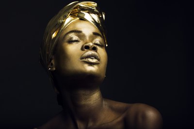 Gold beauty editorial close-up. Studio photography by Cape Town's Nick van der Touw.