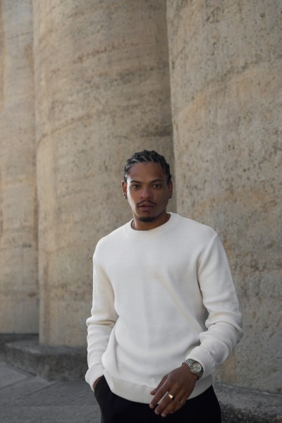 Muti Summer 2024 campaign frame against a textured stone wall. By Nick van der Touw.