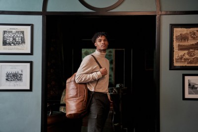 Woodstock Leather 2021 campaign frame in a vintage interior archway. By Nick van der Touw.