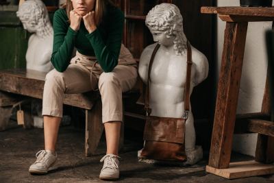 Woodstock Leather 2021 campaign frame with a sculptural bust. Fashion photography by Nick van der Touw.