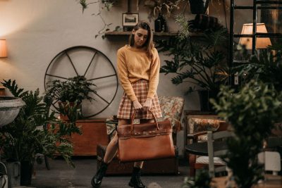 Woodstock Leather 2021 campaign frame with interior plants. Fashion photography by Nick van der Touw.