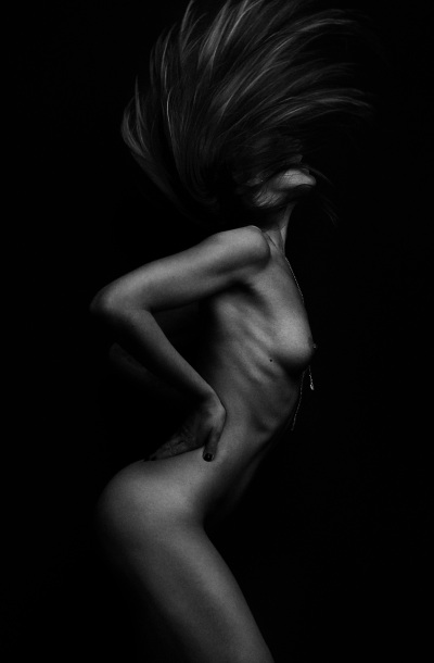 Fine art studio nude in soft sidelight. Editorial photography by Cape Town-based photographer Nick van der Touw.
